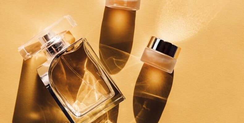 two clear glass perfume bottles